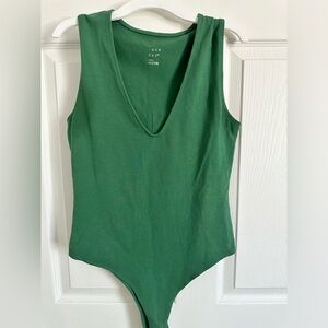 a new day green bodysuit